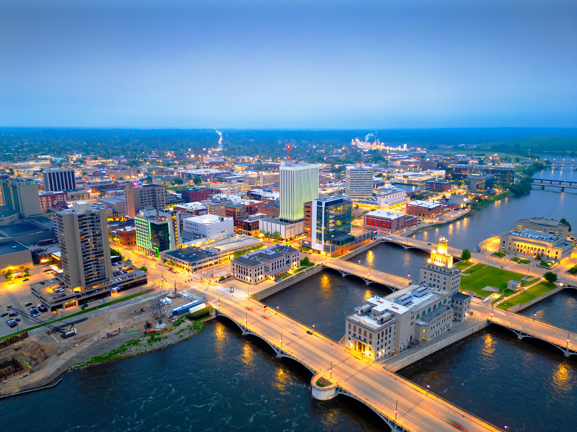 Aerial view of Cedar Rapids, Iowa downtown with lights at dusk